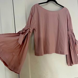 FREE PEOPLE NEW large cropped dusty rose peasant top bell arms button back bow